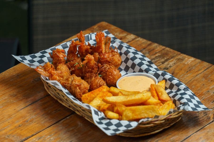Fried shrimp basket on a wooden table